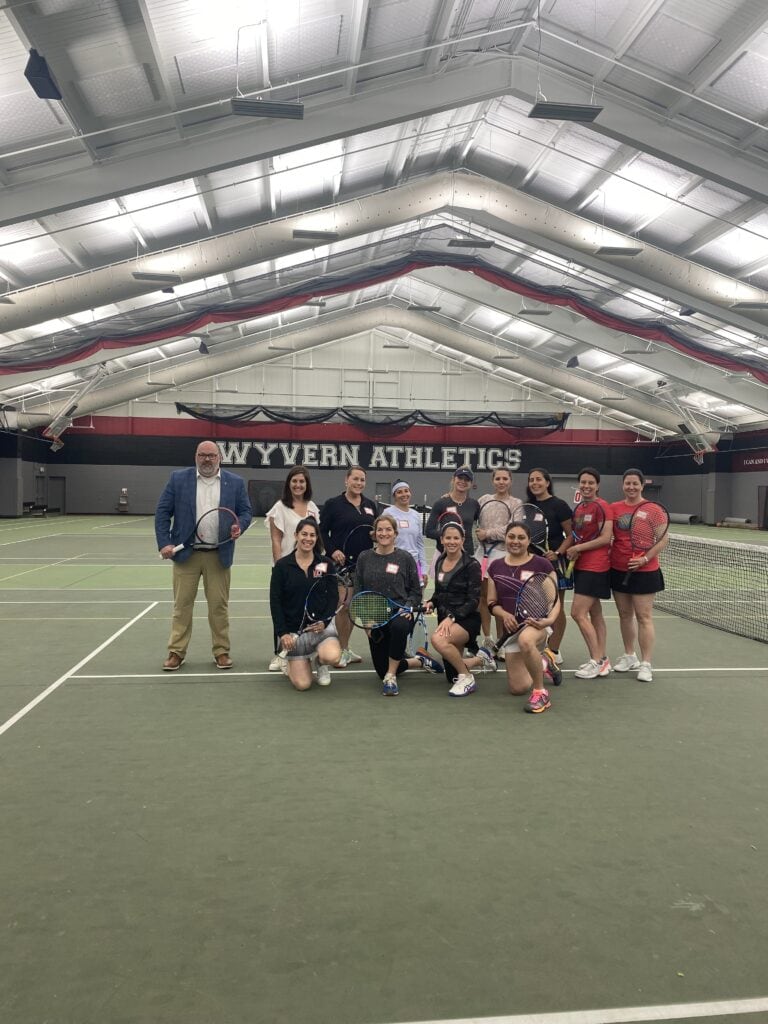 Parent involvment is central to the KO experience. Here they are at the tennis tournament