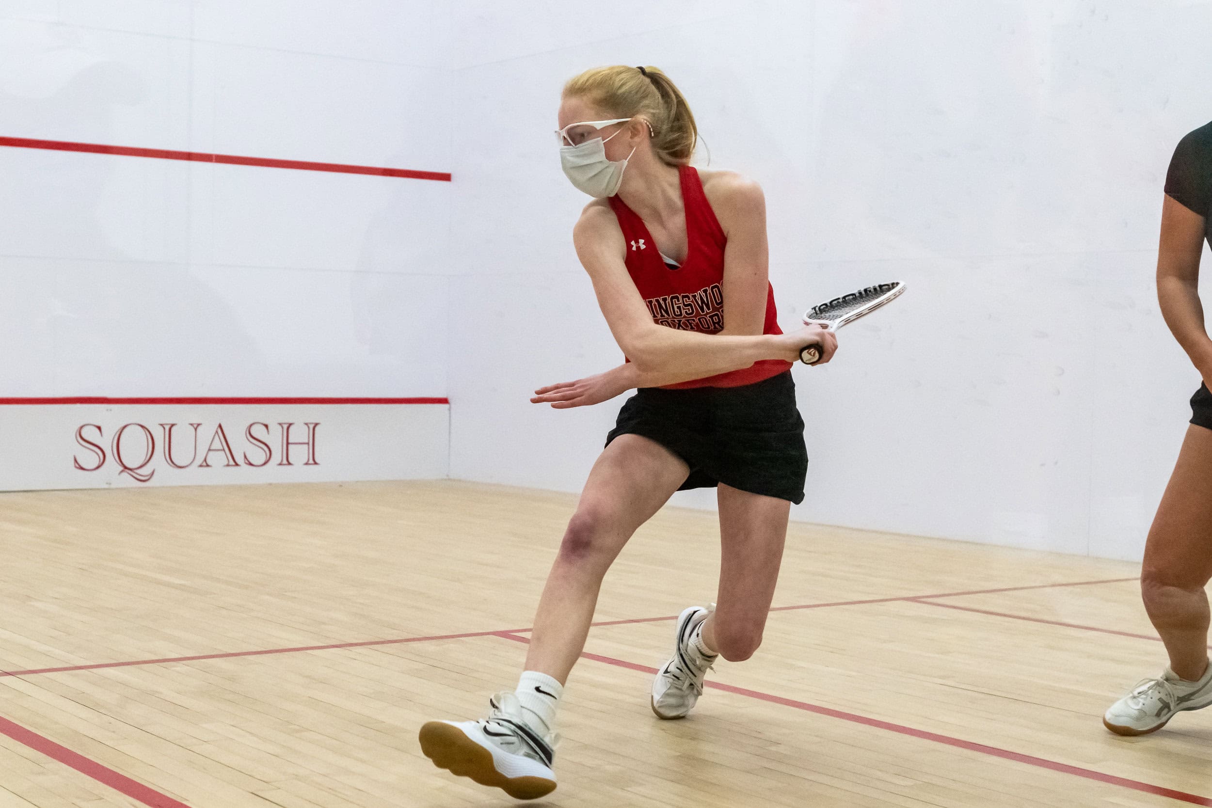 Girls Squash Girls play competitive sports and squash at Kingswood Oxford in West Hartford
