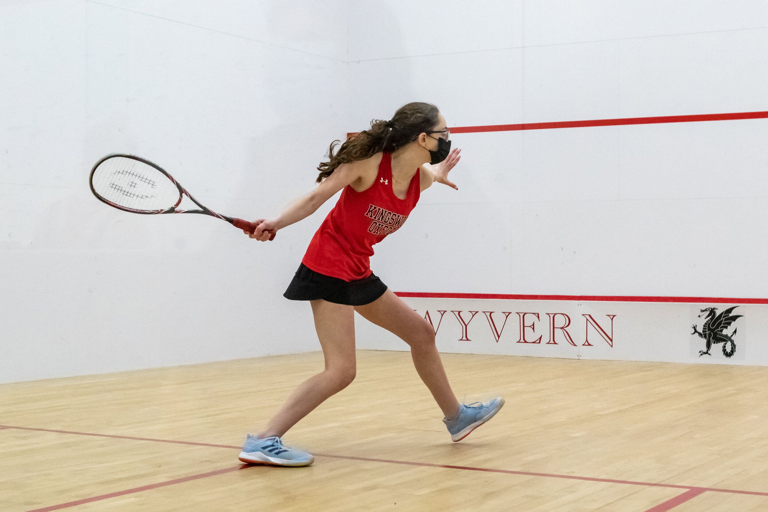 Girls Squash Girls play competitive sports and squash at Kingswood Oxford in West Hartford