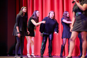 Students at Kingswood Oxford in Hartford perform in an a cappella festival and workshop with professional vocalists.