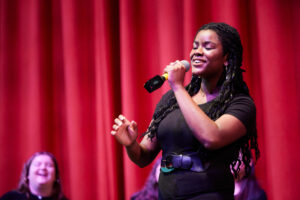 Students at Kingswood Oxford in Hartford perform in an a cappella festival and workshop with professional vocalists.