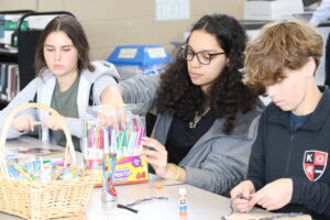 Students at Kingswood Oxford in West Hartford work on service learning projects for the United Way