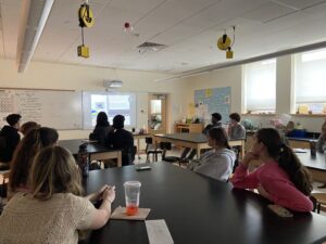 Environmental science class tours research vessel.